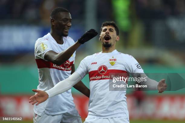 Gil Dias of Stuttgart celebrates scoring his team's first goal with Serhou Guirassy during the DFB Cup round of 16 match between SC Paderborn 07 and...