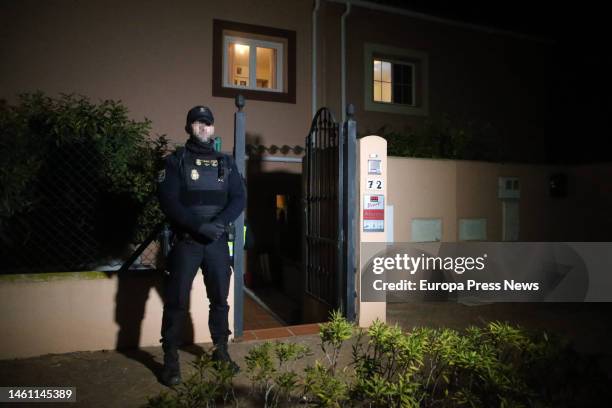National police officer guards the house where the bodies of a man and a woman shot dead were found on January 31, 2023 in La Linea . This afternoon,...