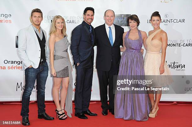 Prince Albert II of Monaco poses with the 'Bold & Beautiful' cast Scott Clifton, Kim Matula, Don Diamont, Hunter Tylo and Jacqueline Mac Innes Wood...