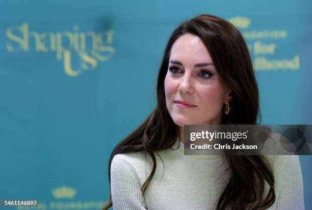 Catherine, Princess of Wales chats with students on the Childhood Studies BA at the University of Leeds on January 31, 2023 in Leeds, England. The...