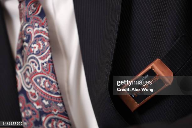 Rep. Thomas Massie wears a ticker that shows the national debt numbers during a hearing before the House Committee on Rules January 31, 2023 in...