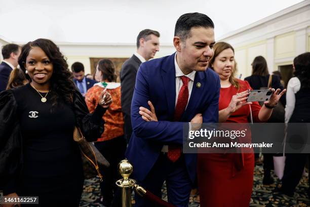 Rep. Jasmine Crockett , Rep. Robert Garcia and Rep. Yadira Caraveo look on as the crystal flute gifted to President James Madison in 1813, sits on...