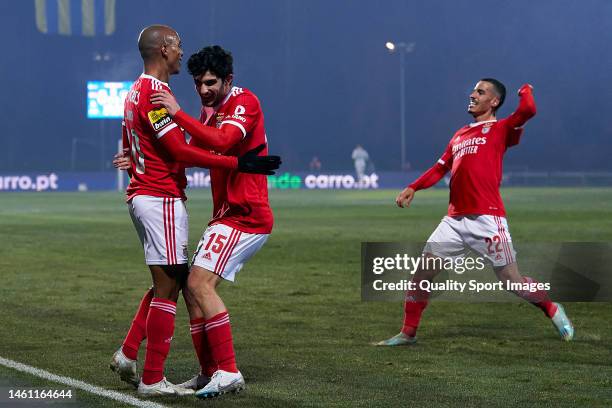 Joao Mario of SL Benfica celebrates with Goncalo Guedes and Chiquinho after scoring his team's first goal during the Liga Portugal Bwin match between...