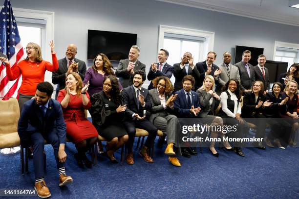 Freshman Democrats of the 118th Congress applaud during a class photo in the Library of Congress on January 31, 2023 in Washington, DC. Rep. Robert...