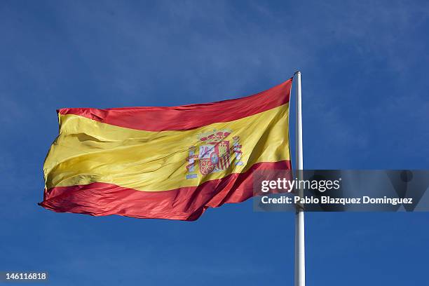 The Spanish flag blow in the wind in Colon Square on June 10, 2012 in Madrid, Spain. Following Spanish Prime Minister Mariano Rajoy's request...