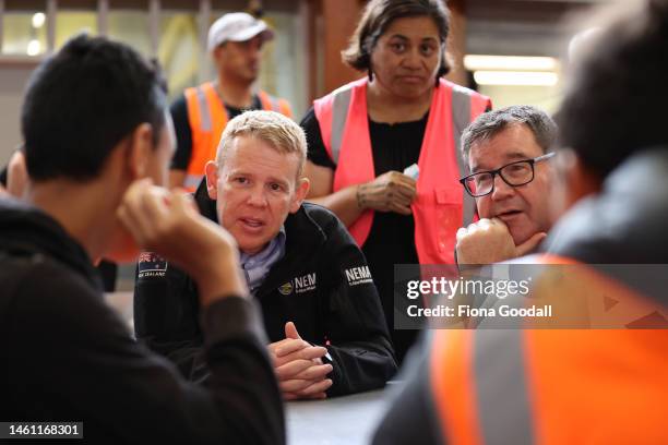 Prime Minister Chris Hipkins and Finance Minister Grant Robertson speak to young volunteers at the Moana Nui A Kiwa Hub in Mangere on February 01,...