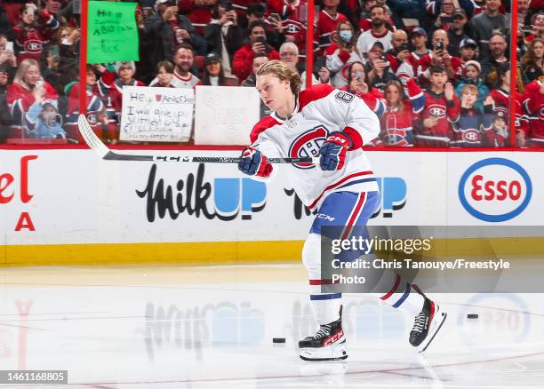 Owen Beck of the Montreal Canadiens takes his rookie lap during warmups prior to his first NHL game against the Ottawa Senators at Canadian Tire...
