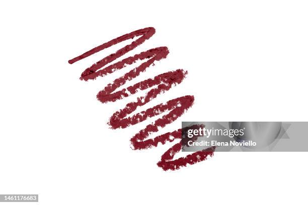 texture stroke of lipstick or lip liner  red or burgundy color - lip gloss smudge stock-fotos und bilder