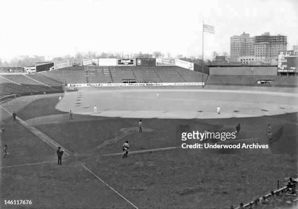 Baseball game at Yankee Stadium with no one in the bleachers, New York, New York, mid 1920s.