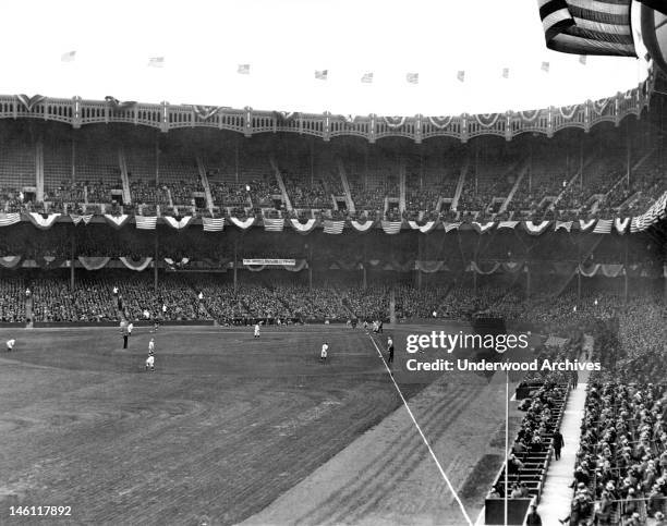 View of Yankee Stadium and the fans watching the Yankees play, New York, New York, mid 1920s.