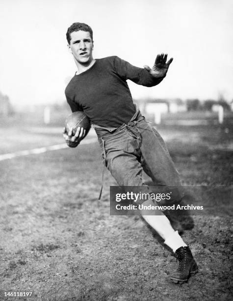 Francis Layden, left halfback for Notre Dame, Notre Dame, Indiana, December 13, 1934. He is the younger brother of Elmer Layden, who is not only the...