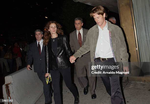 Actress Julia Roberts and husband Danny Moder leave the screening of "Punch-Drunk Love" at Alice Tully Hall during the 10th Annual New York Film...