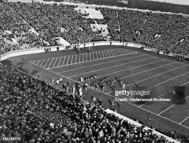 An action shot during the Notre Dame-University of Southern California game, which was won by USC, 16-14, South Bend, Indiana, November 21, 1931. It...