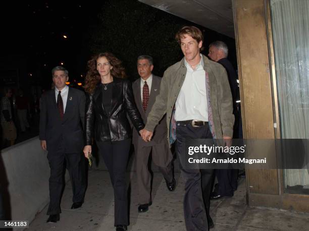 Actress Julia Roberts and husband Danny Moder leave the screening of "Punch-Drunk Love" at Alice Tully Hall during the 10th Annual New York Film...