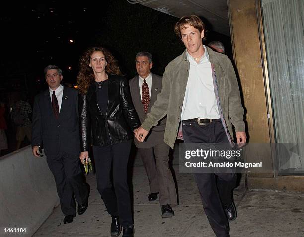 Actress Julia Roberts and husband Danny Moder leave the screening of "Punch-Drunk Love" at Alice Tully Hall during the 10th Annual New York Film...