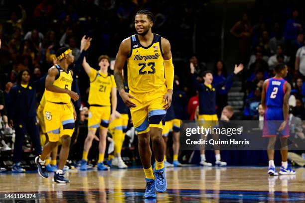 David Joplin of the Marquette Golden Eagles reacts after his 3-point basket in the second half against the DePaul Blue Demons at Wintrust Arena on...