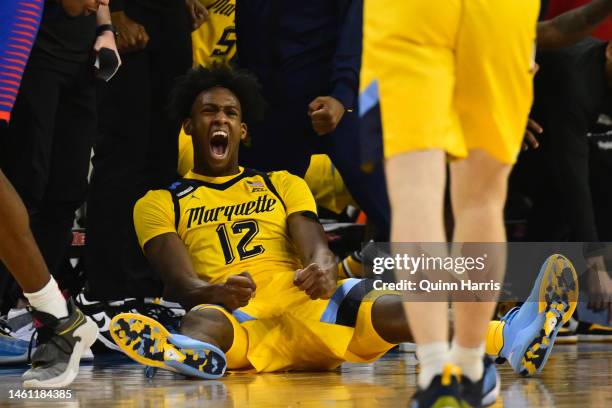 Olivier-Maxence Prosper of the Marquette Golden Eagles reacts after being fouled during his 3-point basket against the DePaul Blue Demons at Wintrust...