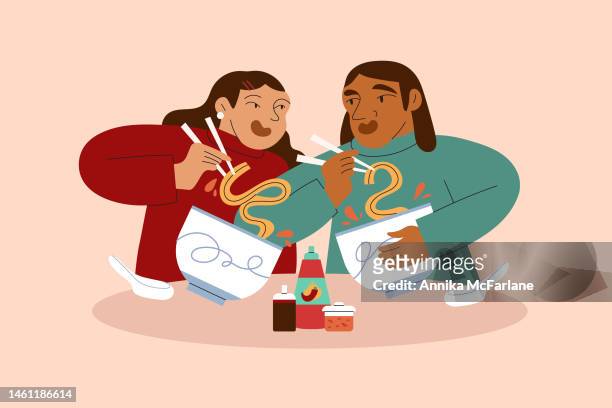 ilustraciones, imágenes clip art, dibujos animados e iconos de stock de una pareja de raza mixta disfruta comiendo fideos asiáticos para la noche de cita - amor y amistad