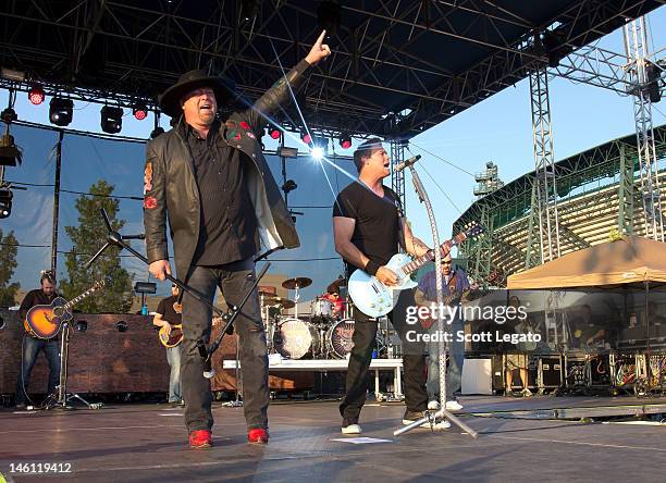 Eddie Montgomery and Troy Gentry of Montgomery Gentry performs during the 2012 Downtown Hoedown at Comerica Park on June 9, 2012 in Detroit, Michigan.