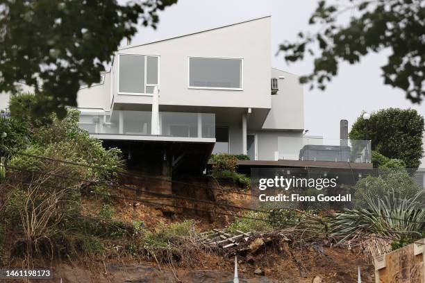 House on Shore Rd in Remuera sits above a slip on February 01, 2023 in Auckland, New Zealand. New Zealand's largest city, Auckland, was hit with a...