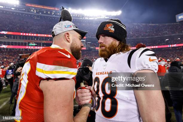 Travis Kelce of the Kansas City Chiefs shakes hands with Hayden Hurst of the Cincinnati Bengals following the AFC Championship NFL football game...