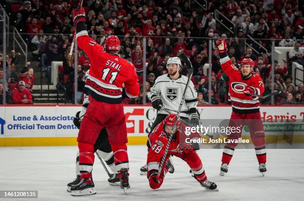 Jordan Staal of the Carolina Hurricanes celebrates with teammates after a goal during the third period against the Los Angeles Kings at PNC Arena on...