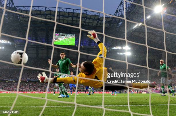 Shay Given of Republic of Ireland fails to stop the first goal from Mario Mandzukic of Croatia during the UEFA EURO 2012 group C between Ireland and...