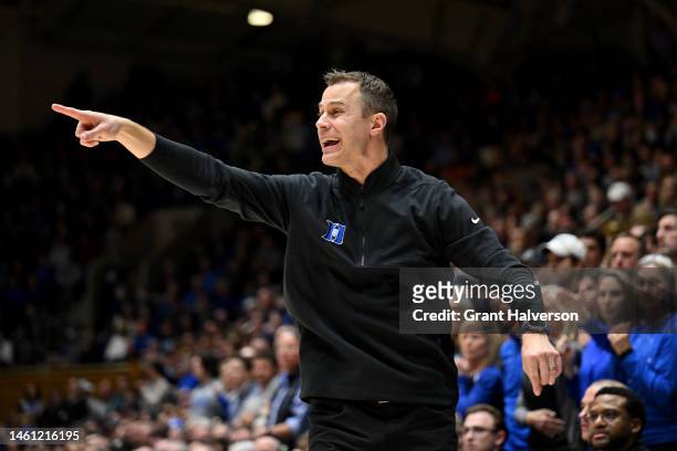 Head coach Jon Scheyer of the Duke Blue Devils reacts during the second half of their game against the Wake Forest Demon Deacons at Cameron Indoor...