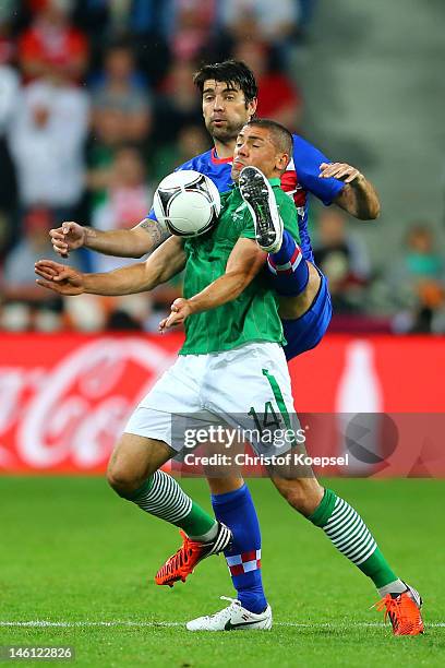 Jonathan Walters of Republic of Ireland and Vedran Corluka of Croatia compete for the ball during the UEFA EURO 2012 group C between Ireland and...