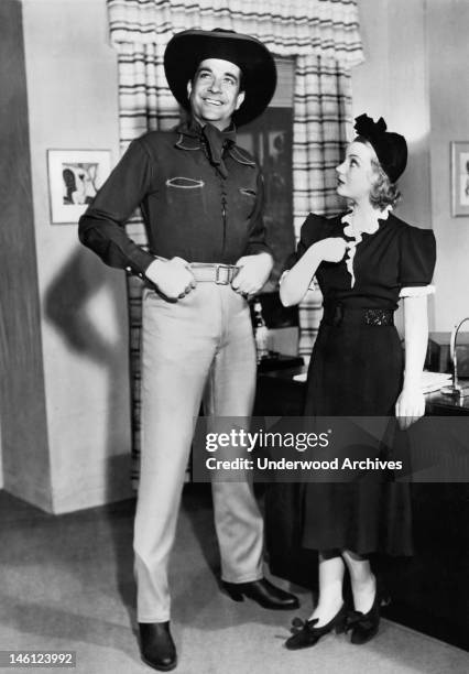 Actors Grant Withers and Helen Chandler in the stage production of 'Boy Meets Girl,' at the El Capitan Theater, Hollywood, California, March, 1937.