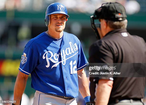 Mitch Maier of the Kansas City Royals reacts after striking out in the eighth inning against the Pittsburgh Pirates during interleague play on June...