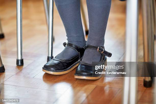 mary janes and knee socks on elementary schoolgirl - girls shoes stock pictures, royalty-free photos & images