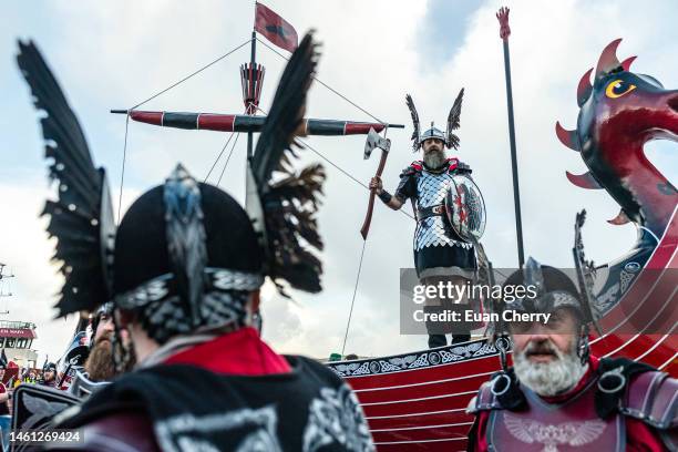 Guizer Jarl is Neil Moncrieff with his squad pose on a boat during the morning procession of Up Helly Aa 2023 on January 31, 2023 in Lerwick,...