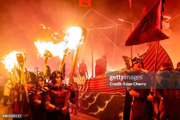 Guizer's lead the galley on the procession before burning during the evening procession of Up Helly Aa 2023 on January 31, 2023 in Lerwick, Scotland....