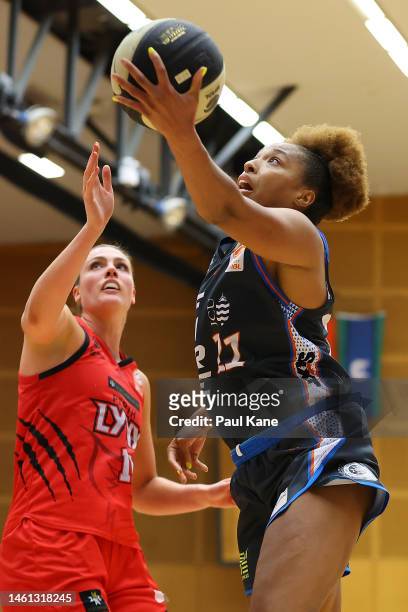 Tianna Hawkins of the Fire goes to the basket during the round 13 WNBL match between Perth Lynx and Townsville Fire at Bendat Basketball Stadium, on...