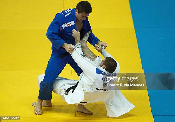 Victor Penalber in action against Travis Stevens during their fight at semifinal -100 Kg Male category as part of the Grand Slam of Judo at Caio...