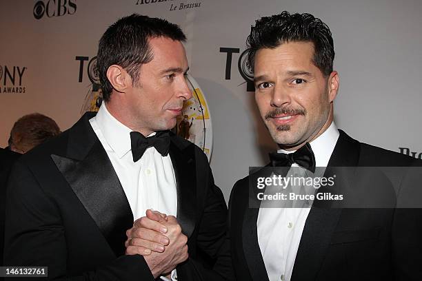 Hugh Jackman and Ricky Martin attend the 66th Annual Tony Awards at the Beacon Theatre on June 10, 2012 in New York City.