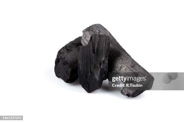 hardwood charcoal coal isolated on white background - carbón fotografías e imágenes de stock