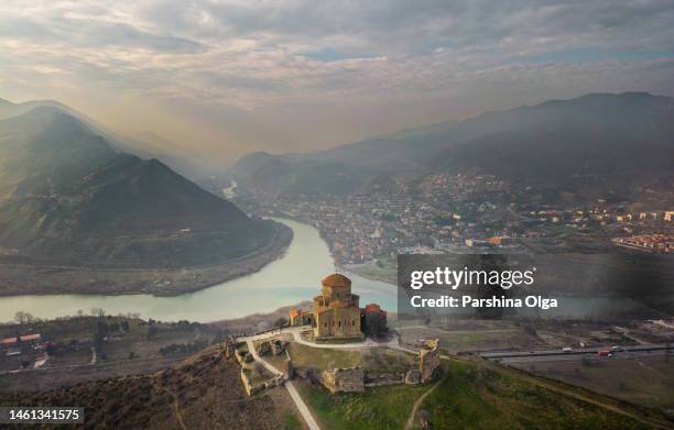 aerial view at jvari monastery with mtskheta town on background. georgia - gray georgia stock pictures, royalty-free photos & images