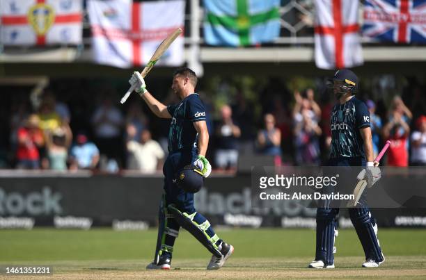 England batsmen Jos Buttler celebrates his century with Dawid Malan during the 3rd ODI match between South Africa and England at De Beers Diamond...