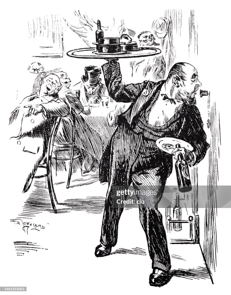 Waiter orders with full hands and a tray over his head over an intercom in the kitchen