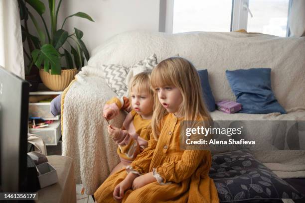 Family Watching Tv Cartoon Photos and Premium High Res Pictures - Getty Images Family Watching Tv Cartoon Photos and Premium High Res Pictures - Getty Images