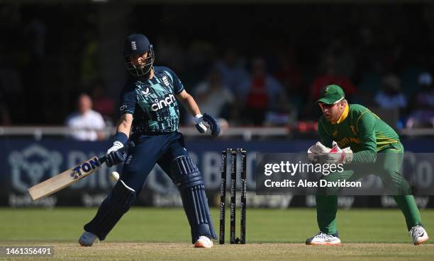 England batter Moeen Ali plays a shot one handed watched by South Africa wicketkeeper Heinrich Klaasen during the 3rd ODI match between South Africa...