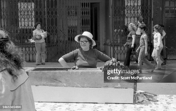 Vendor as she grills kebabs at her food stall on 9th Avenue in Hell's Kitchen during the International Food Festival, New York, New York, May 20,...