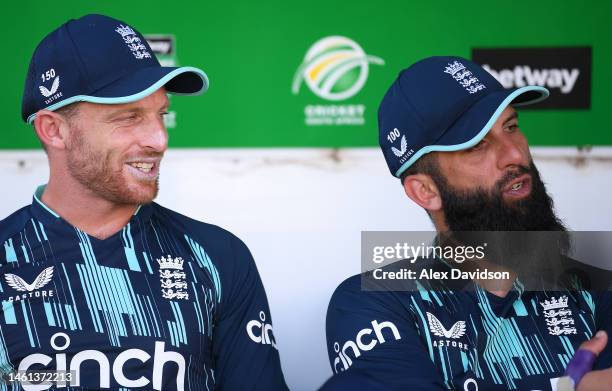 England captain Jos Buttler and Moeen Ali look on during the 3rd ODI match between South Africa and England at De Beers Diamond Oval on February 01,...