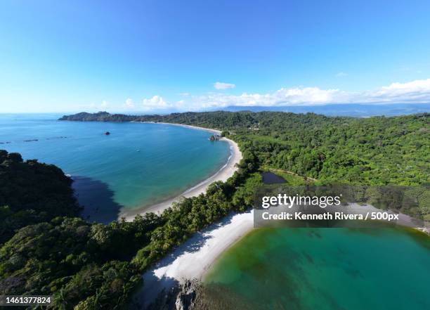 scenic view of sea against blue sky,costa rica - costa rica beach stock-fotos und bilder