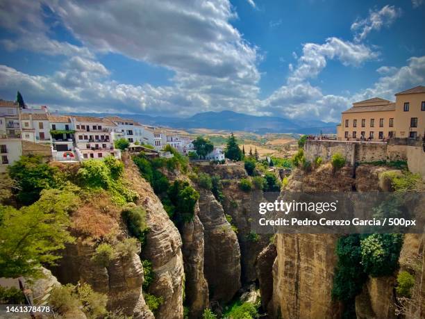 panoramic view of buildings in city against sky - gola di el tajo foto e immagini stock