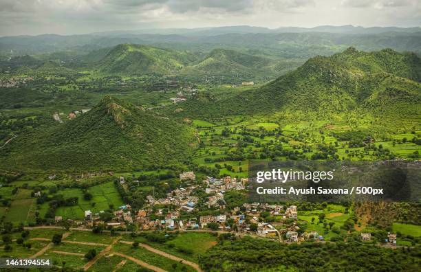 aerial view of agricultural landscape against sky,udaipur,rajasthan,india - udaipur stock pictures, royalty-free photos & images