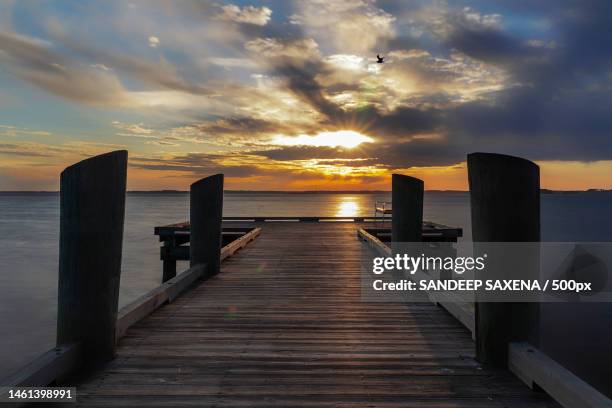 sunset on a cold winter day,ocean city,maryland,united states,usa - ocean city maryland stock pictures, royalty-free photos & images