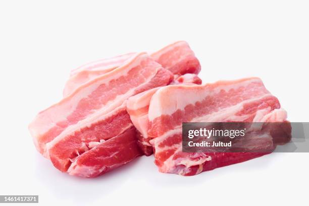 raw pork belly fillets directly on the white background - bacon imagens e fotografias de stock